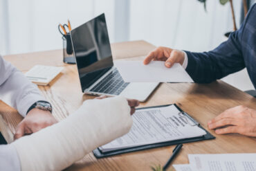 injured person having a consultation with the lawyer