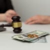 money and ring on the table of the divorce lawyer