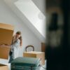 https://www.pexels.com/photo/woman-carrying-boxes-in-new-apartment-4245989/
