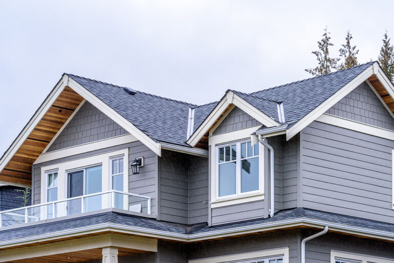 Roof of a large home with windows